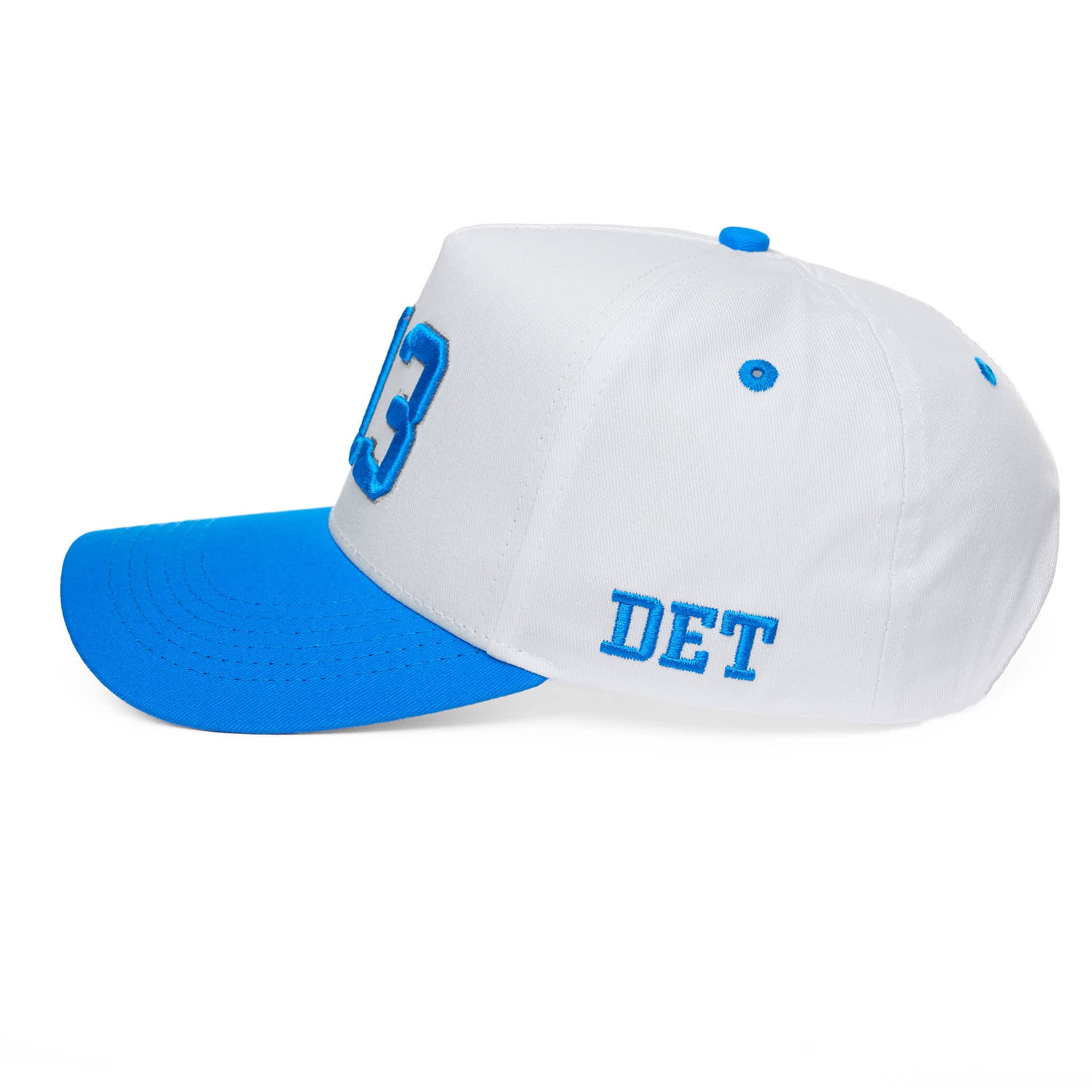 White and blue cap with 'DET' on a white background