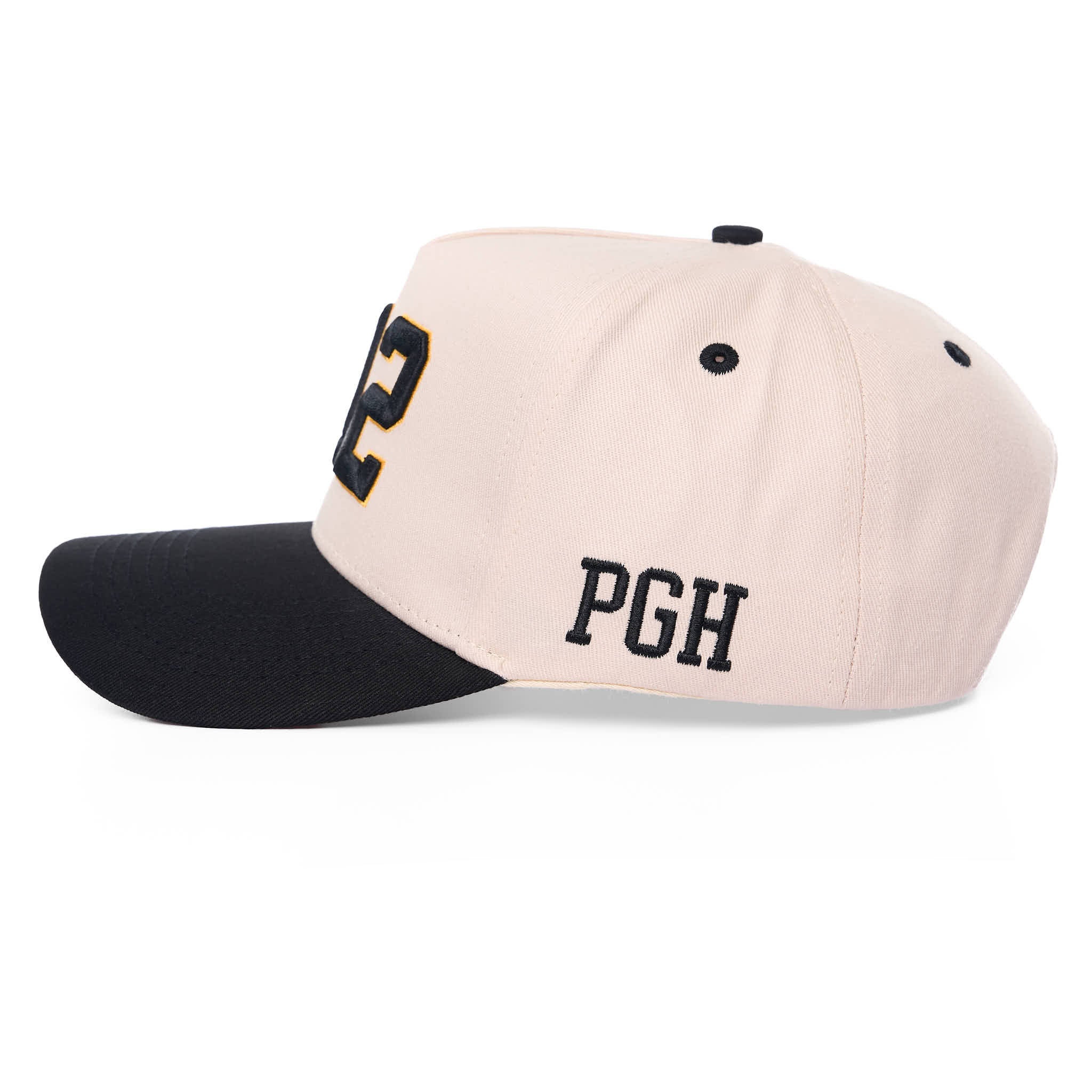 Beige and black cap with 'PGH' on a white background