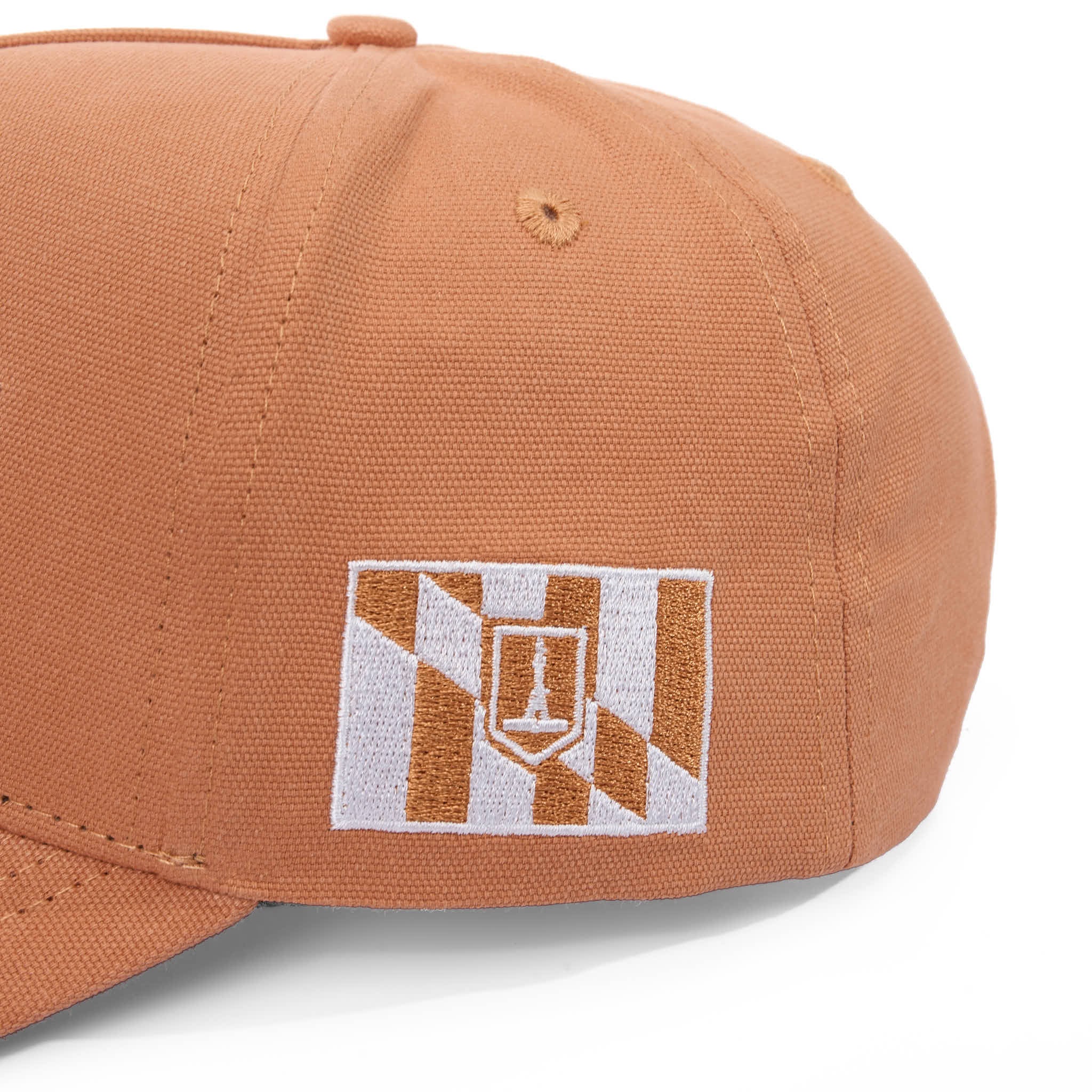 Brown cap with a flag on a white background