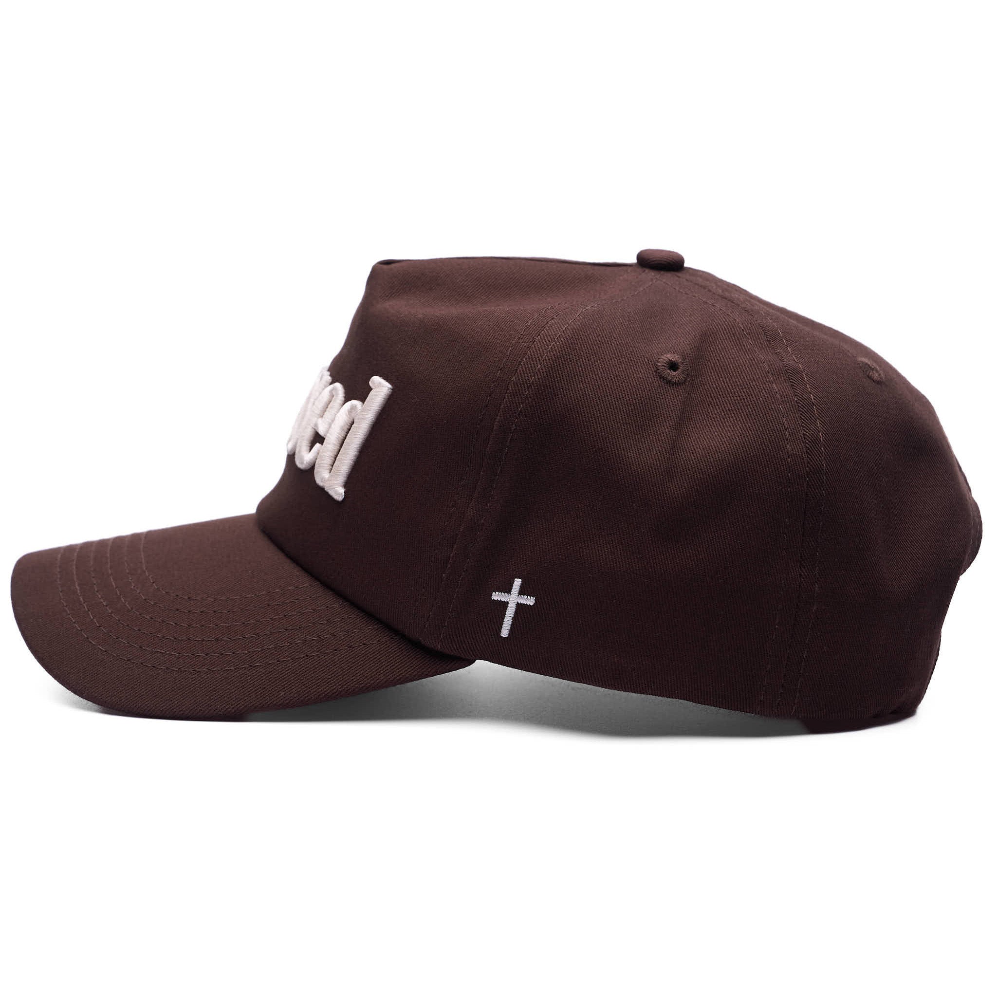 Brown cap with white cross on a white background