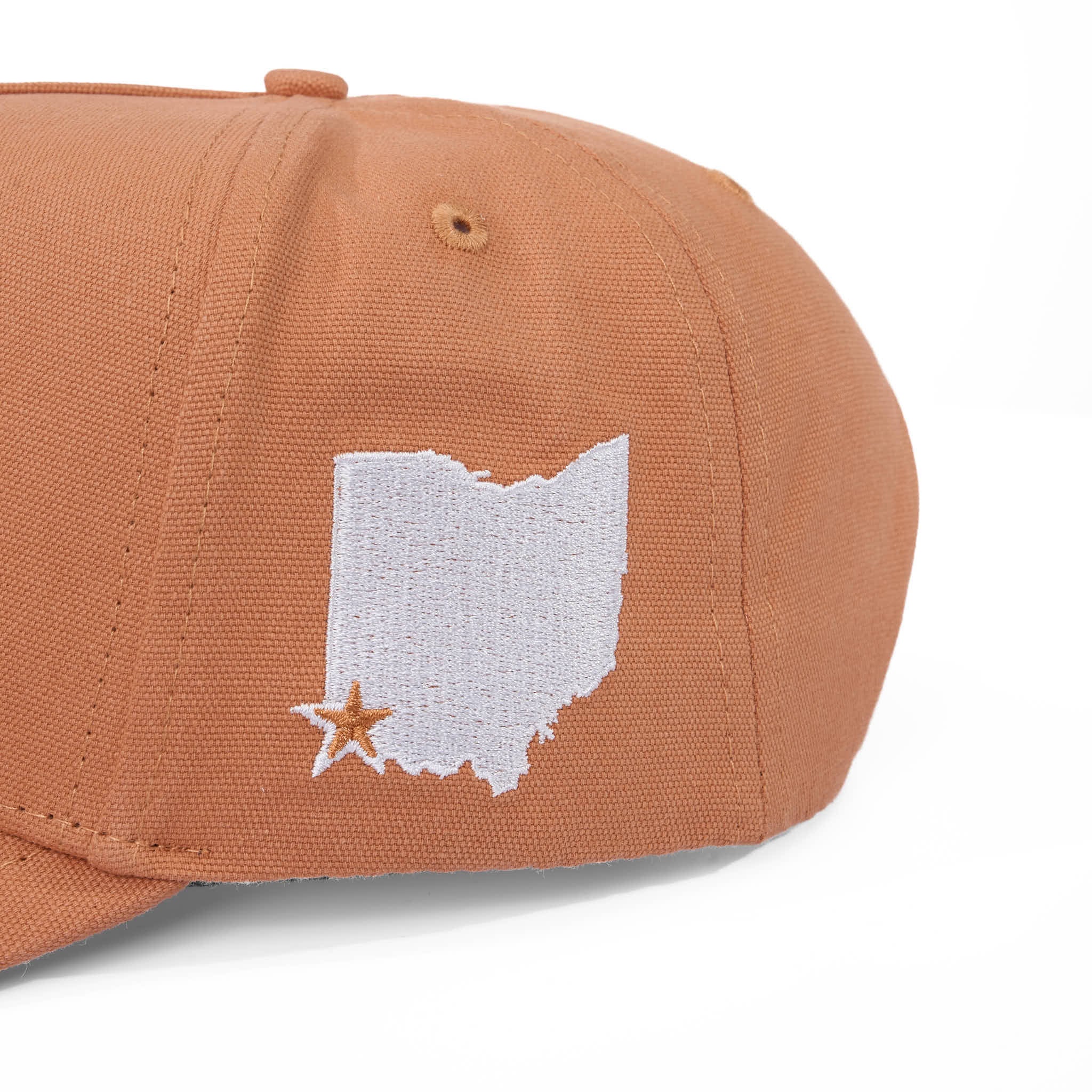 Brown cap with white Ohio outline and star design on a white background