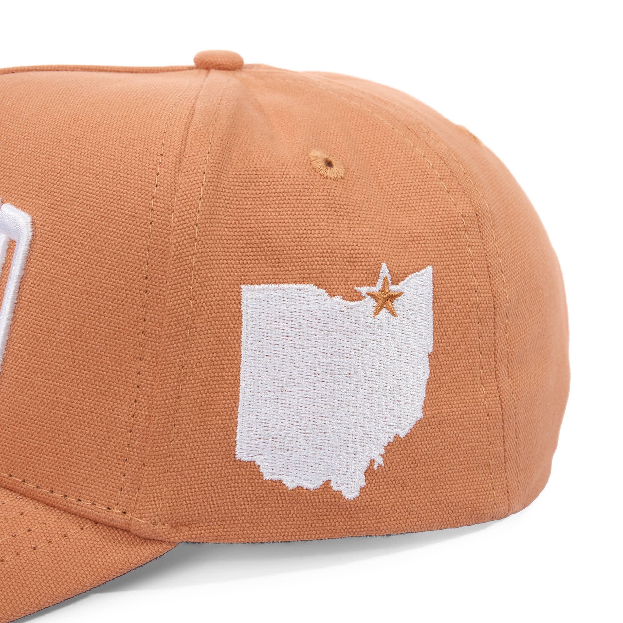 Brown cap with white Ohio map and star design on a white background