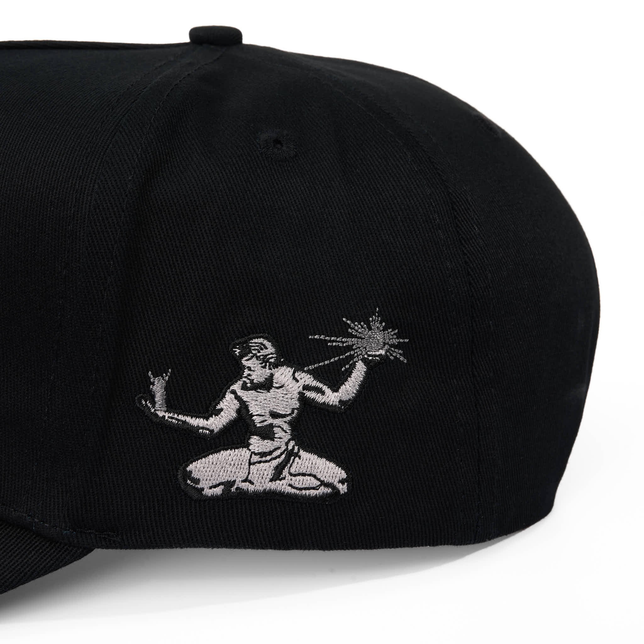 Black cap with white embroidered design on a white background