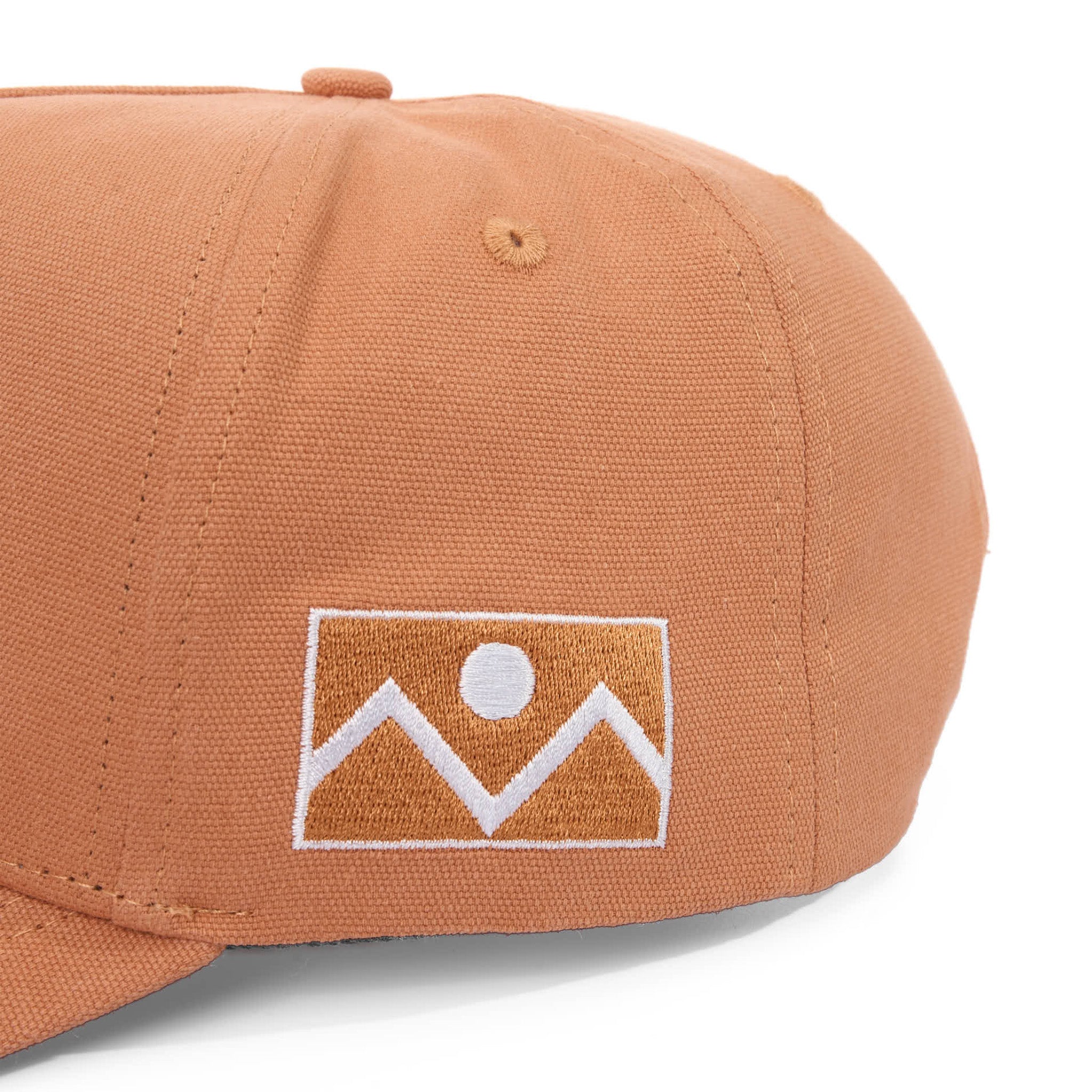 Brown cap with a white denver flag on a white background
