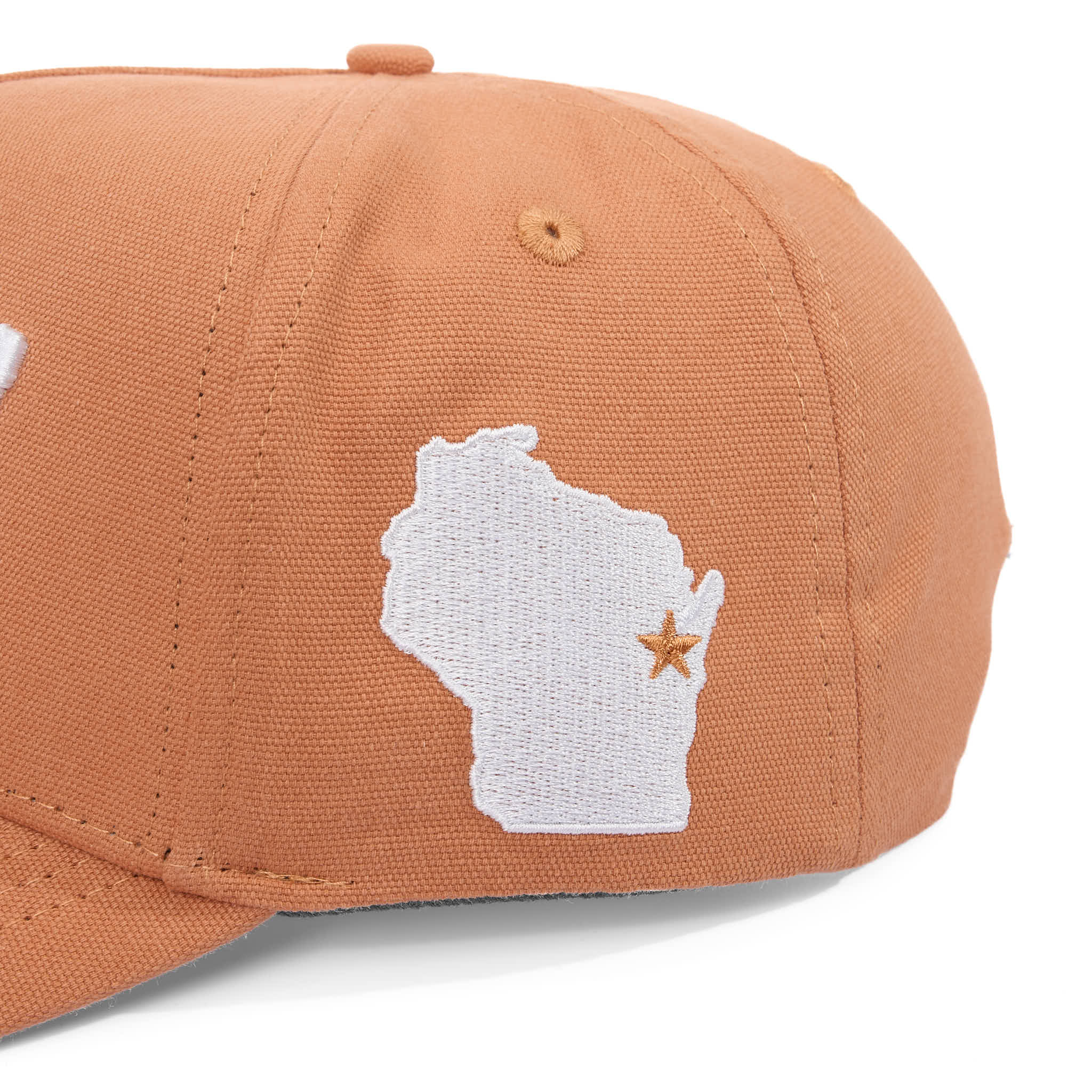 Brown cap with a white embroidered design of a state and star on a white background