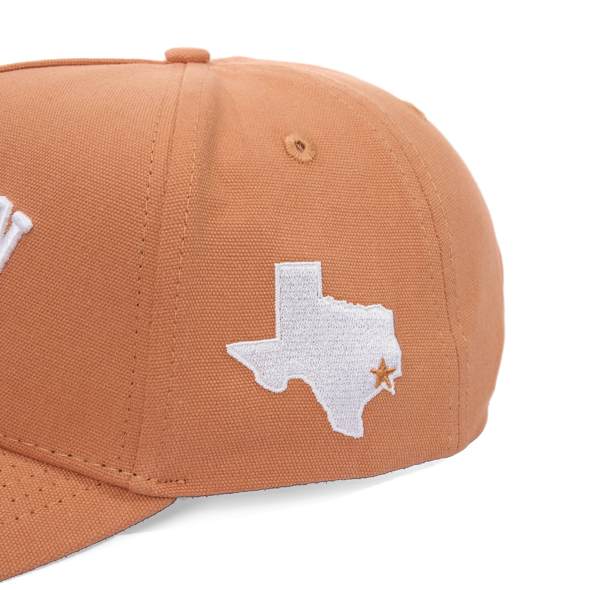 Brown cap with white Texas shape and star on a white background