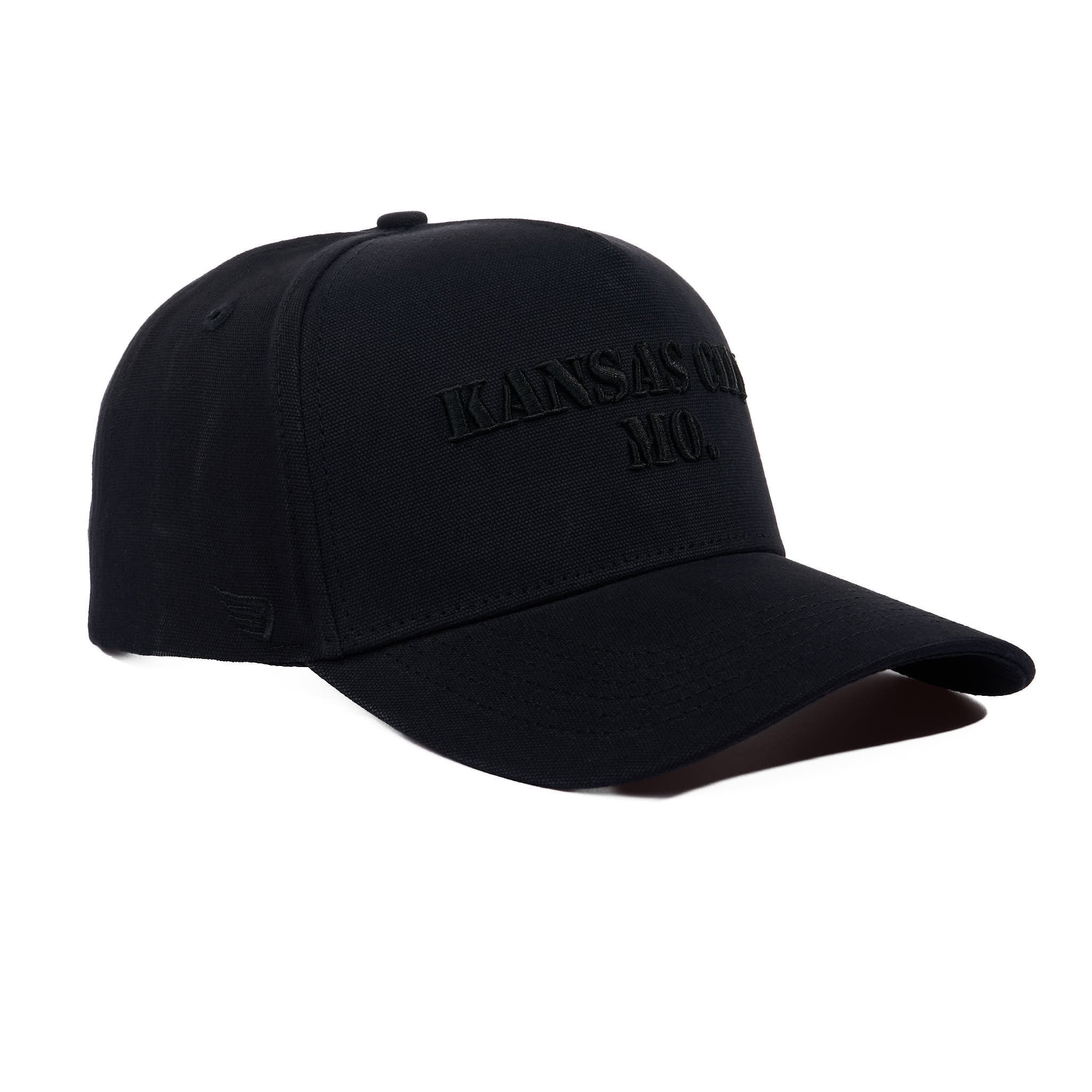 Black cap with 'KANSAS MO' text on a white background