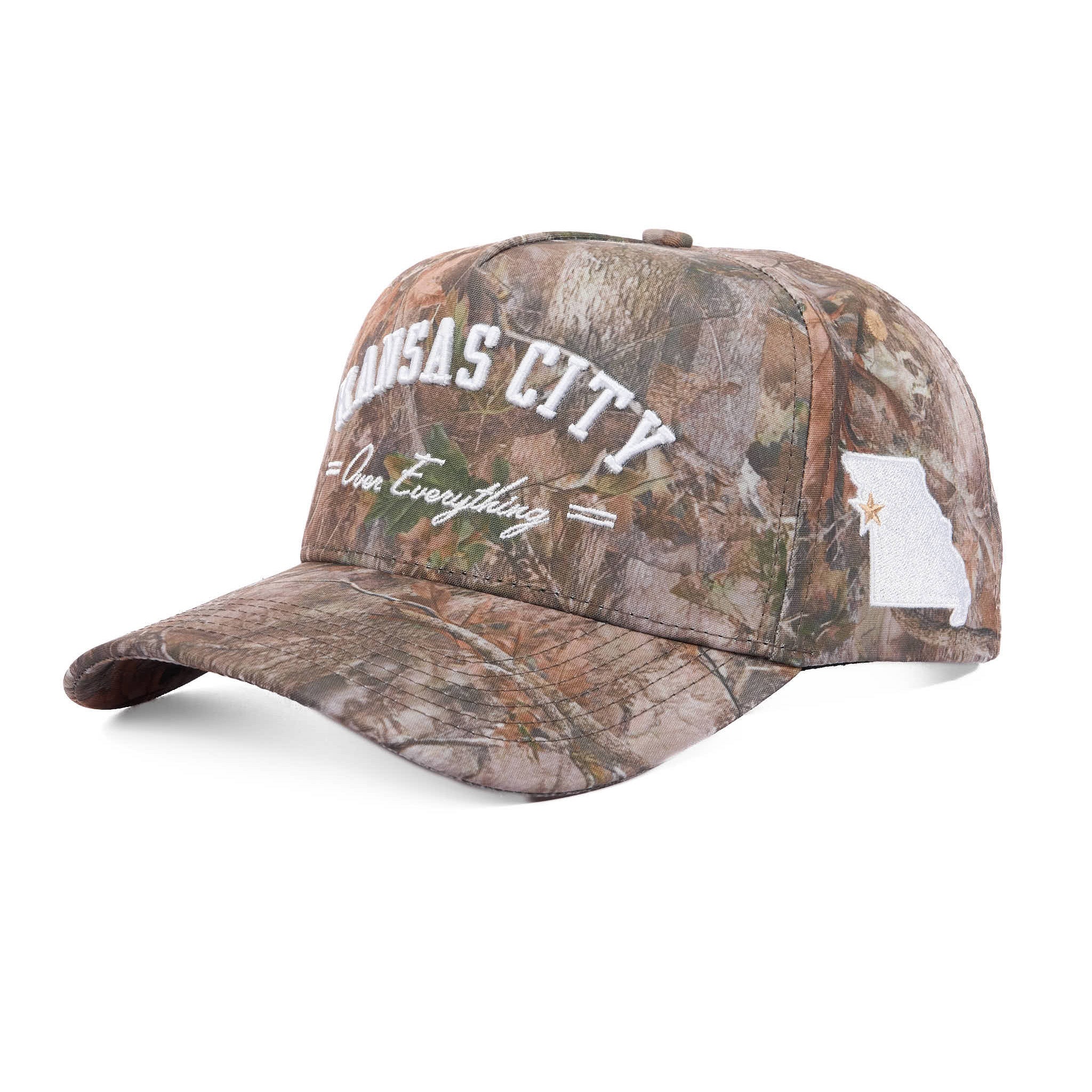 Camouflage baseball cap with 'Kansas City Over Everything' text on a white background