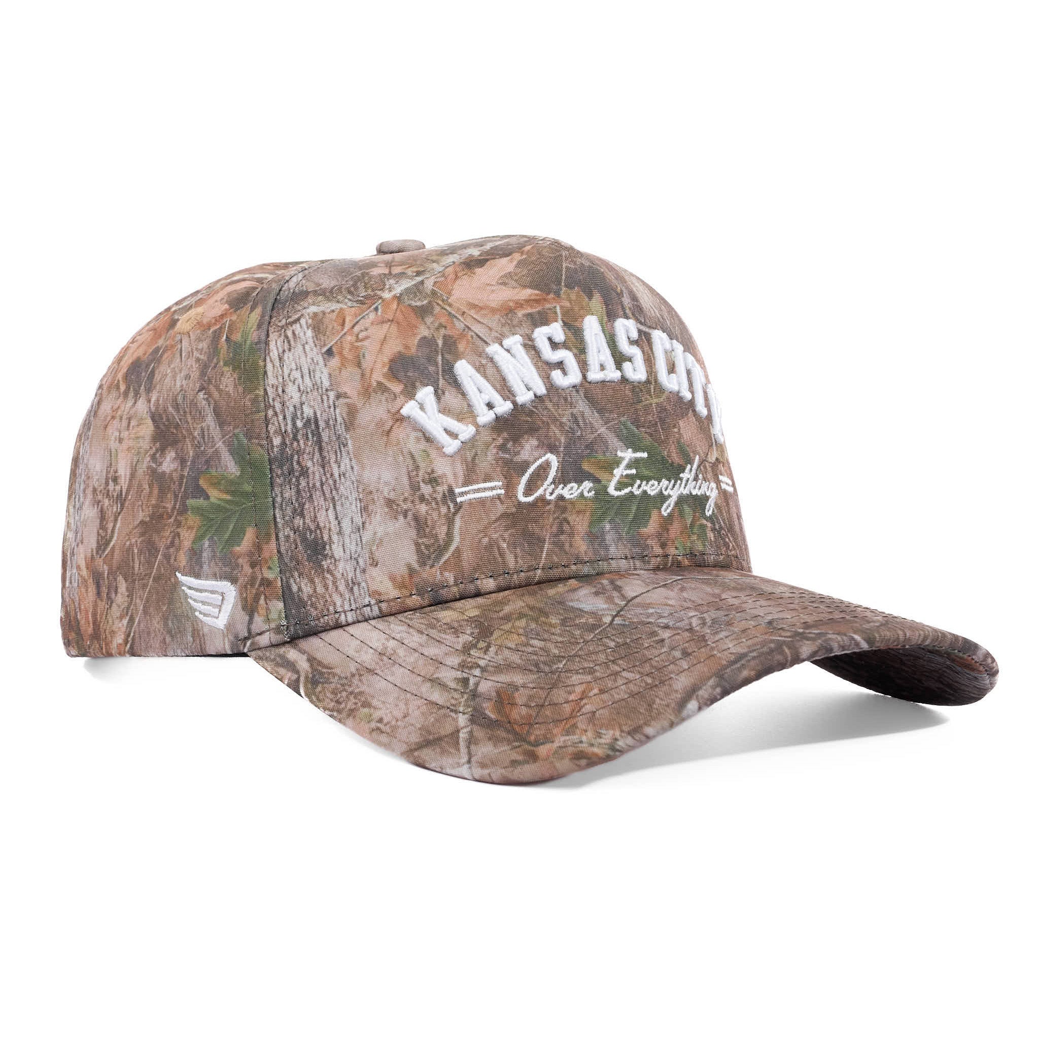 Camouflage baseball cap with 'Kansas City Over Everything' text on a white background