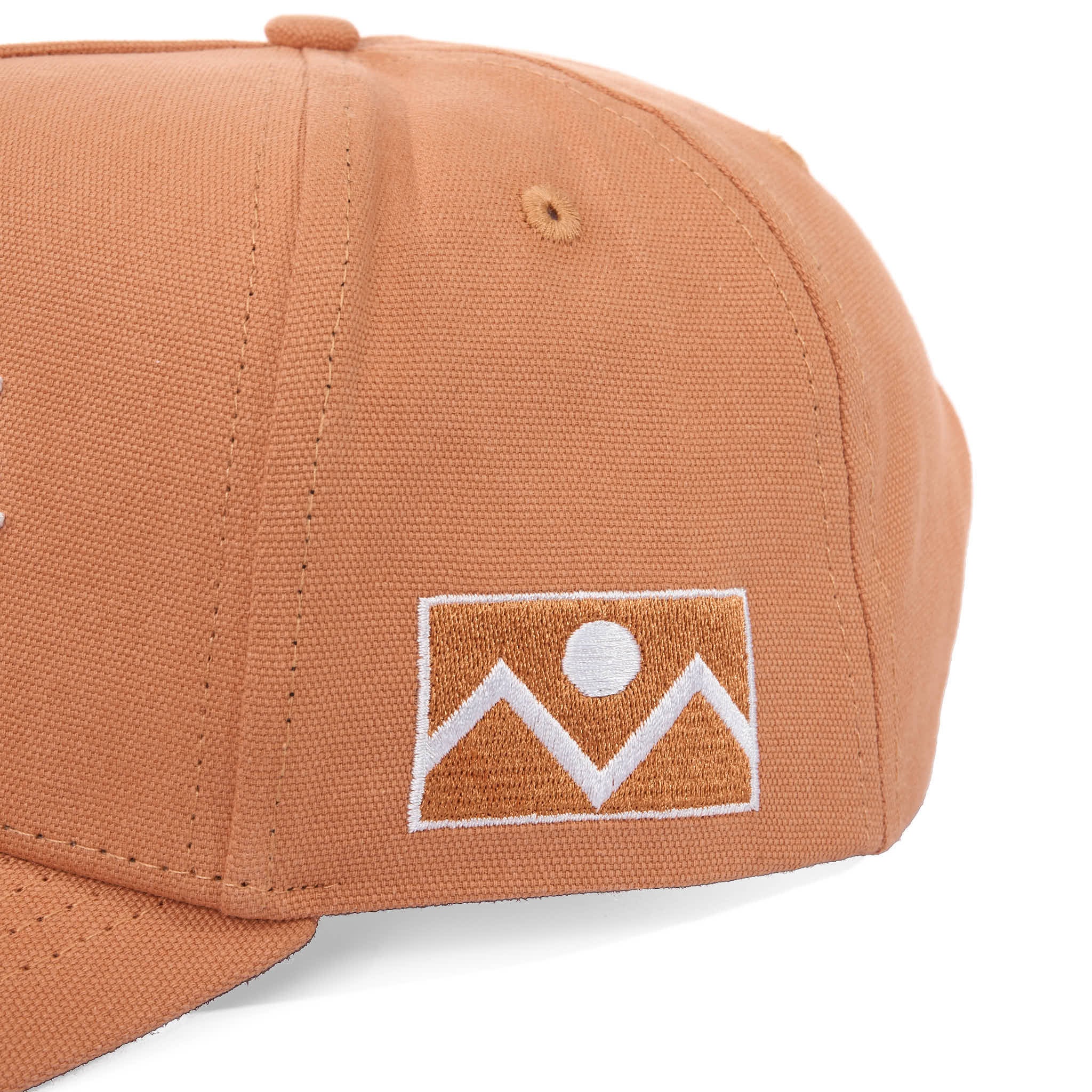 Brown cap with a flag on a white background