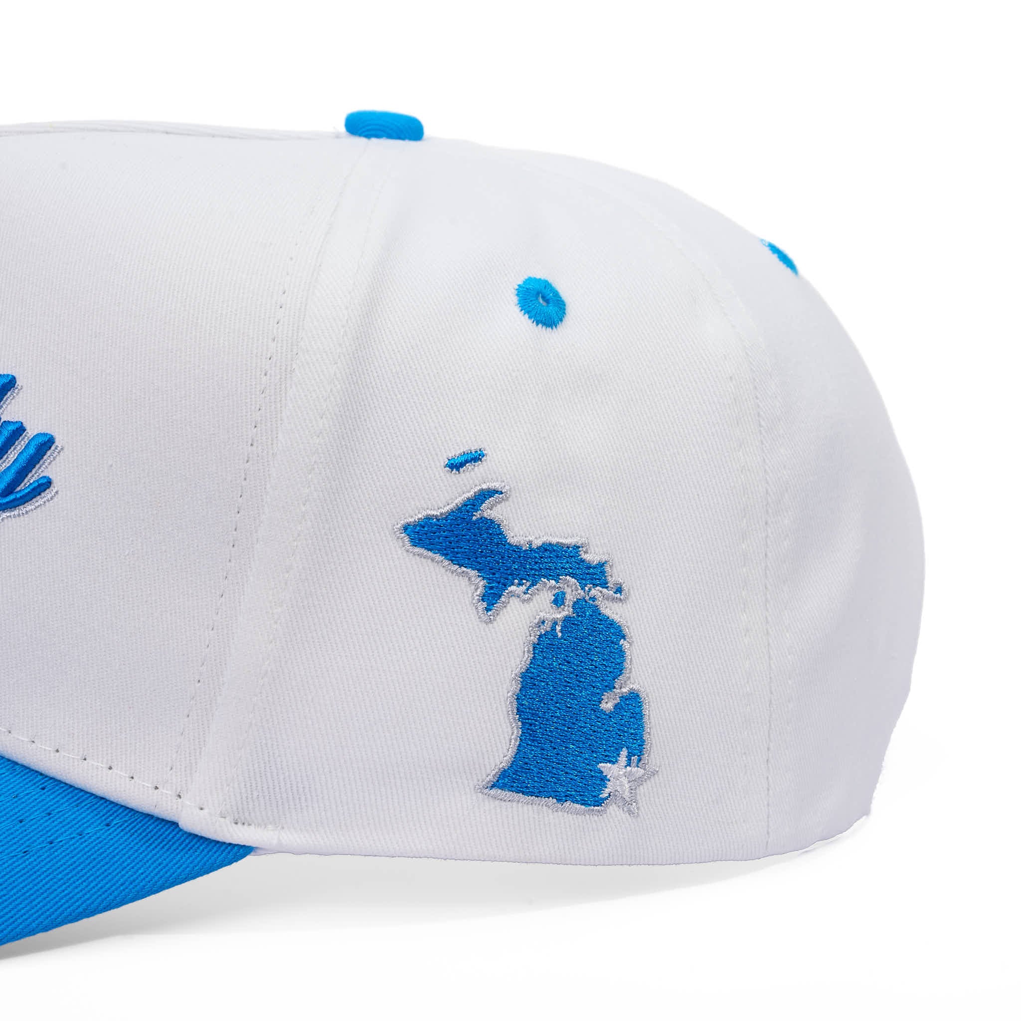 White cap with blue accents and a map design on a white background
