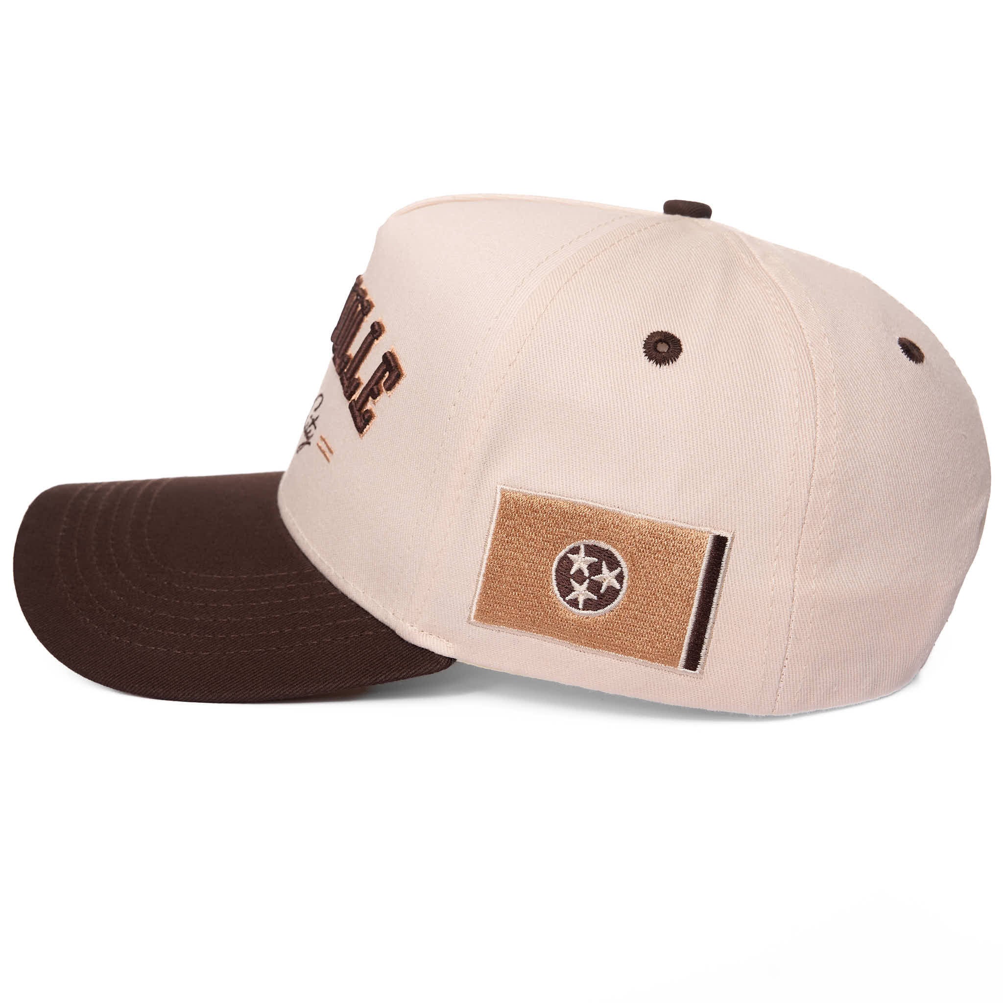 Beige and brown cap with a logo on a white background