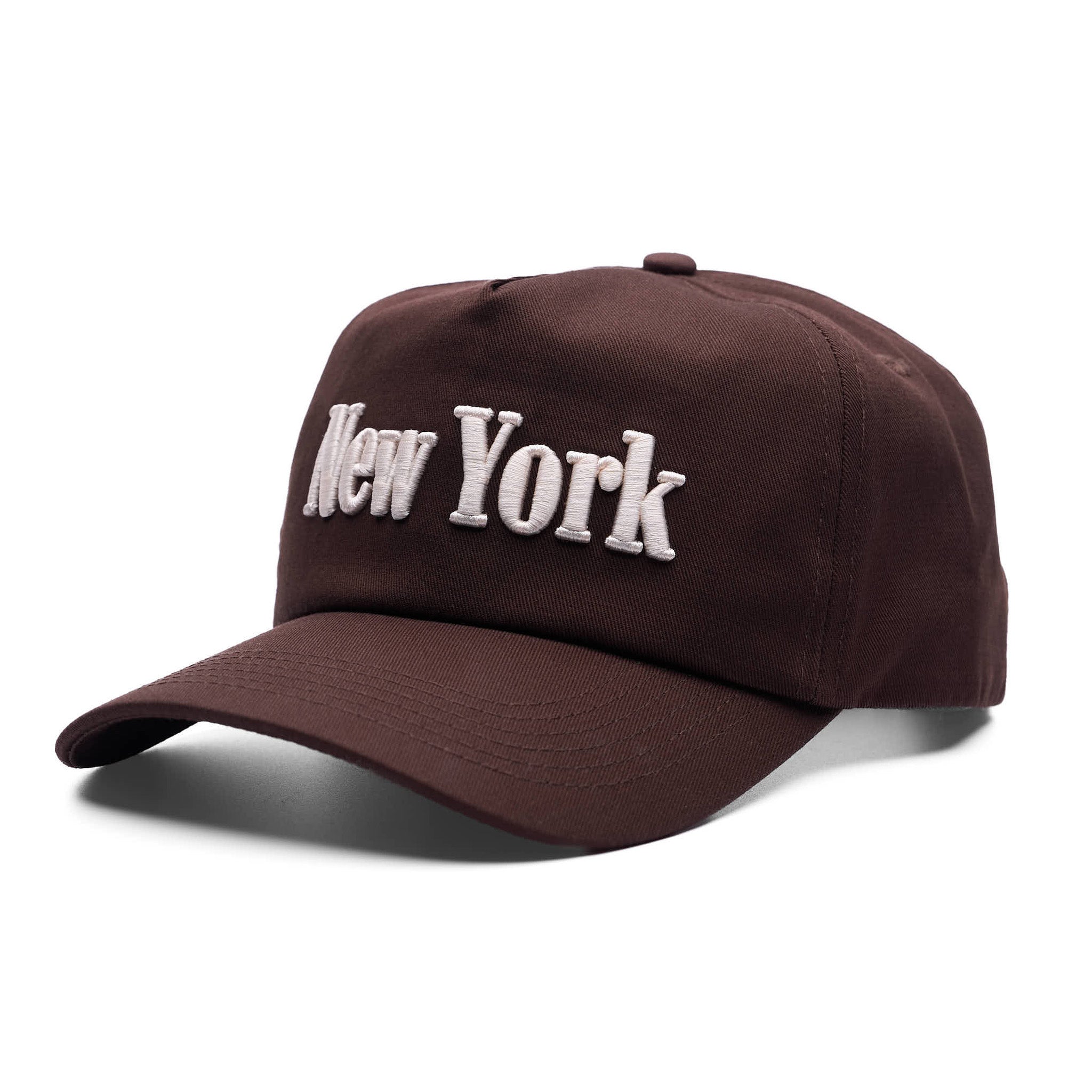 Brown cap with 'New York' text on a white background