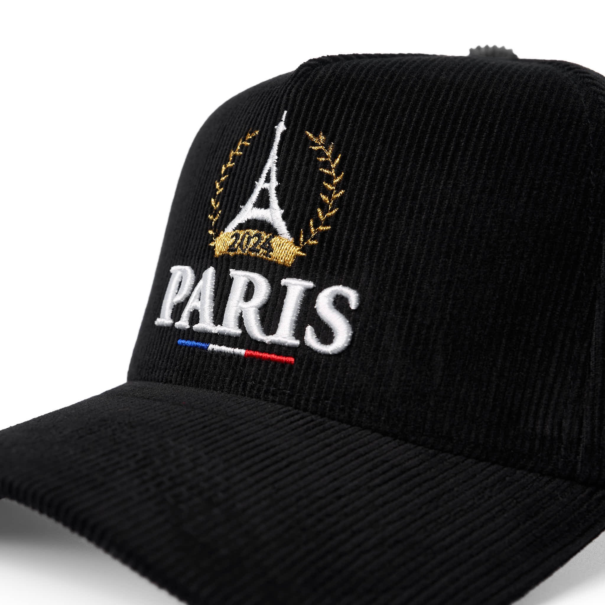 Black cap with Eiffel Tower and 'PARIS' embroidery on a white background