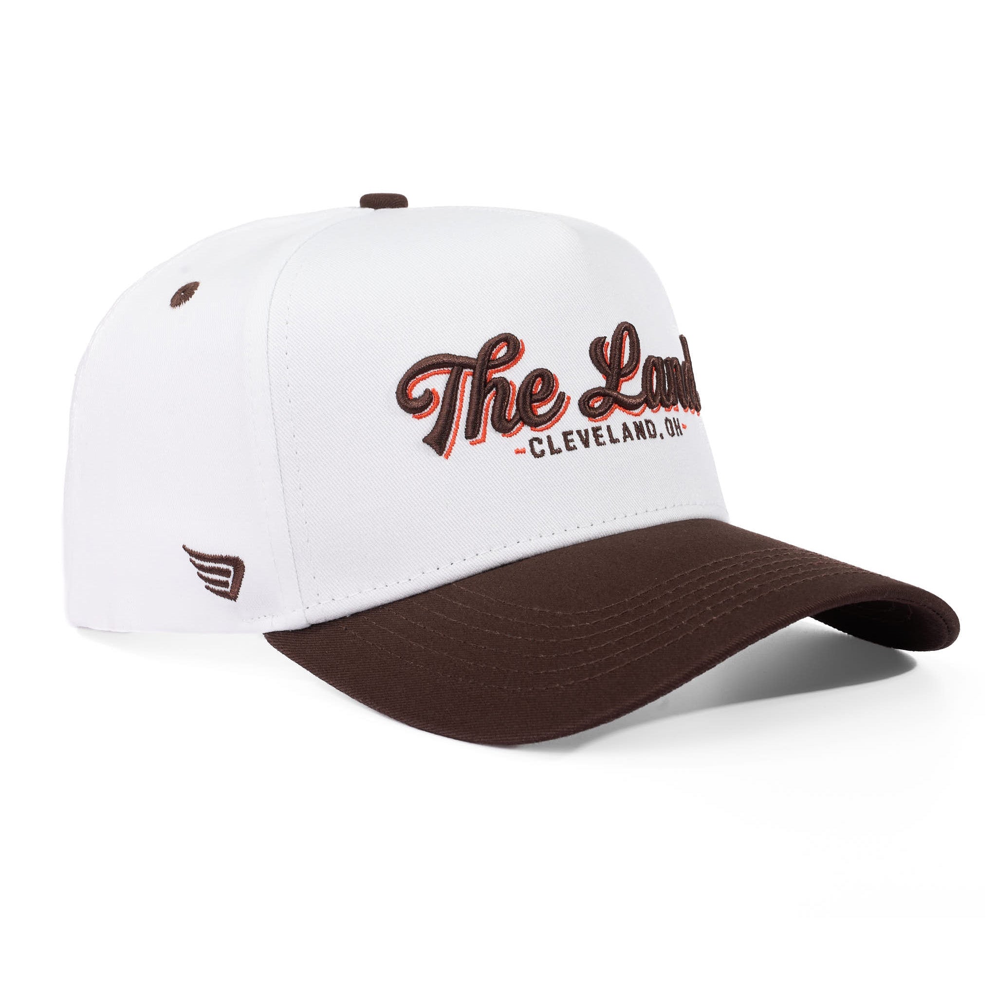 White and brown cap with 'The Land Cleveland, OH' text on a white background