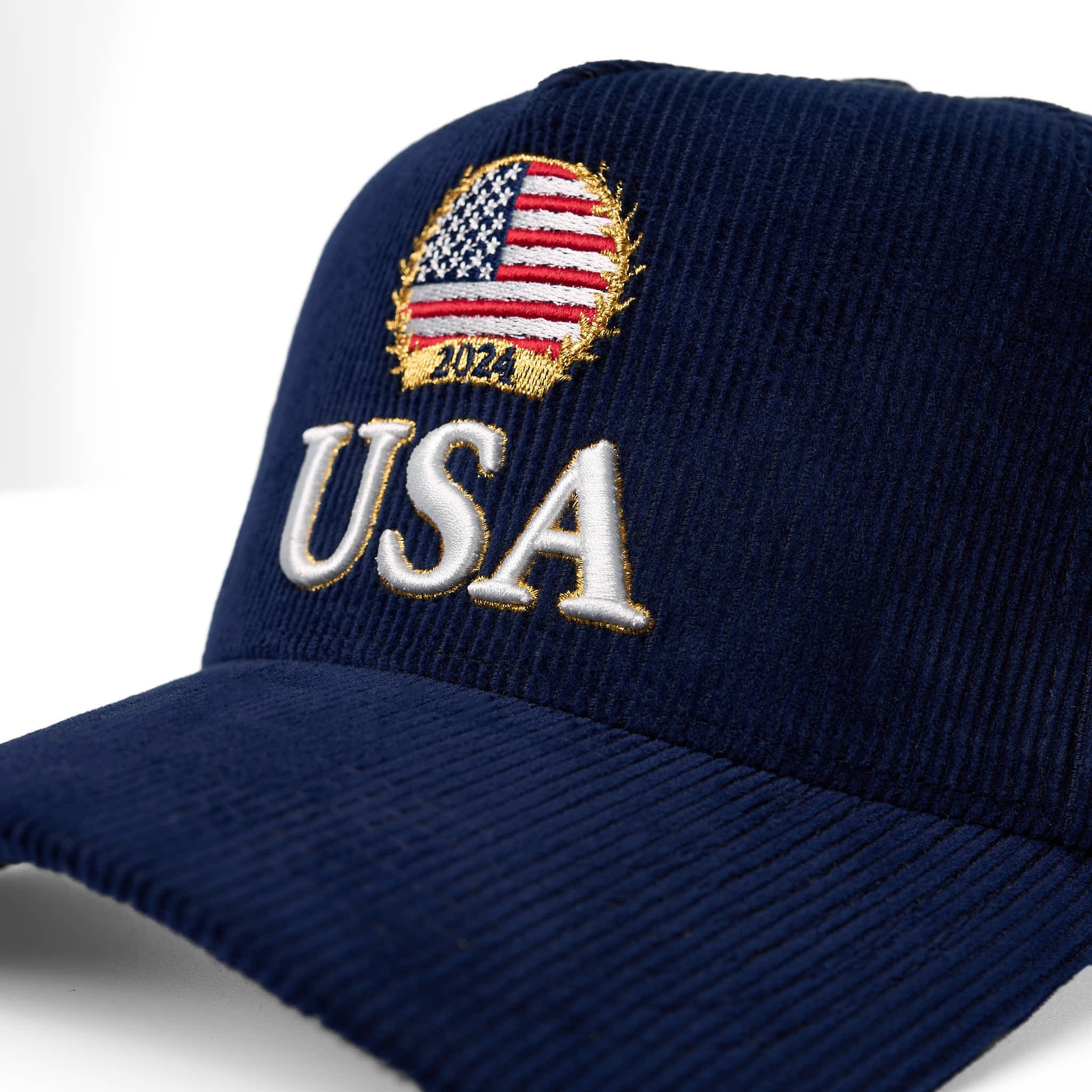 Navy blue cap with USA and 2024 embroidered on a white background