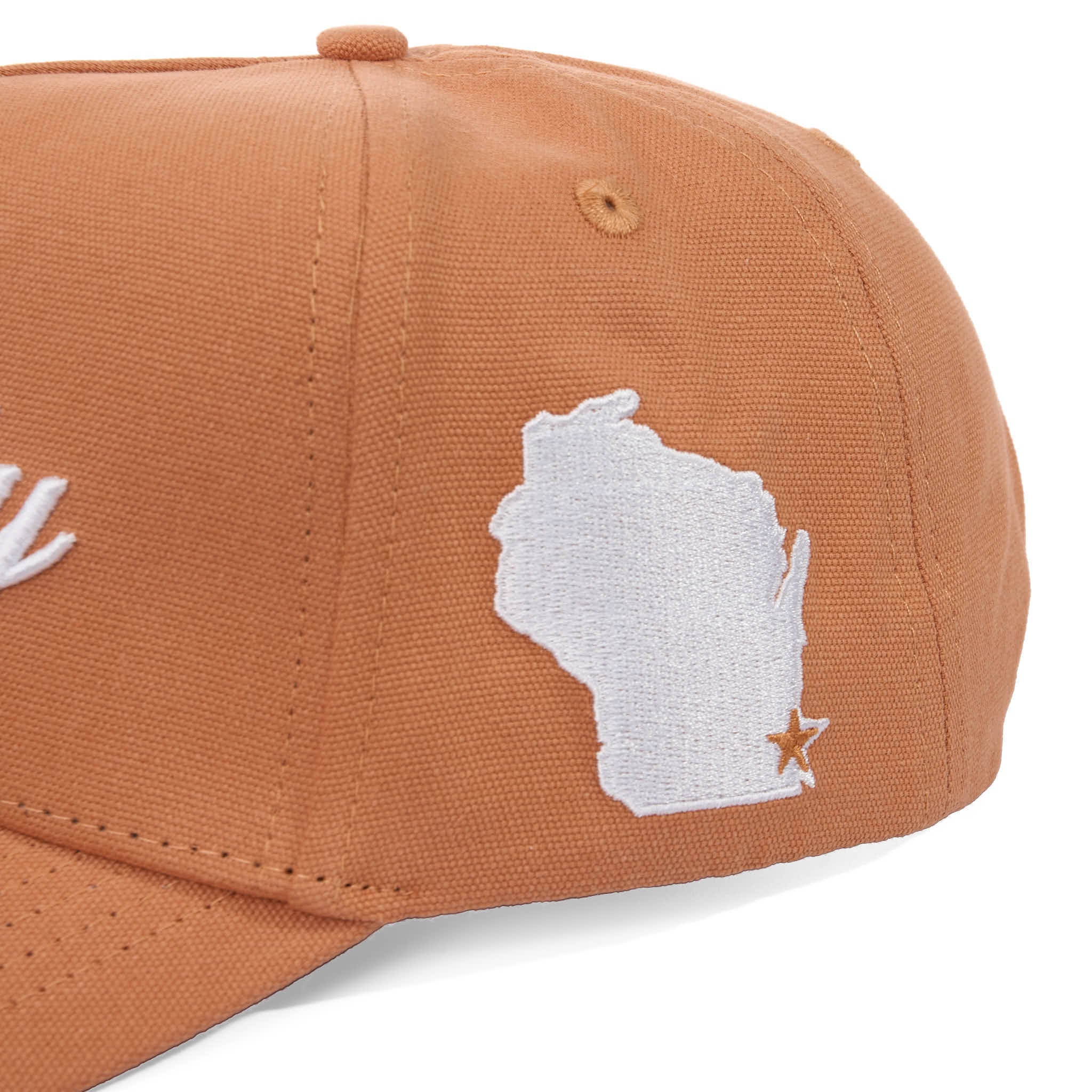 Brown cap with white embroidered design on a white background
