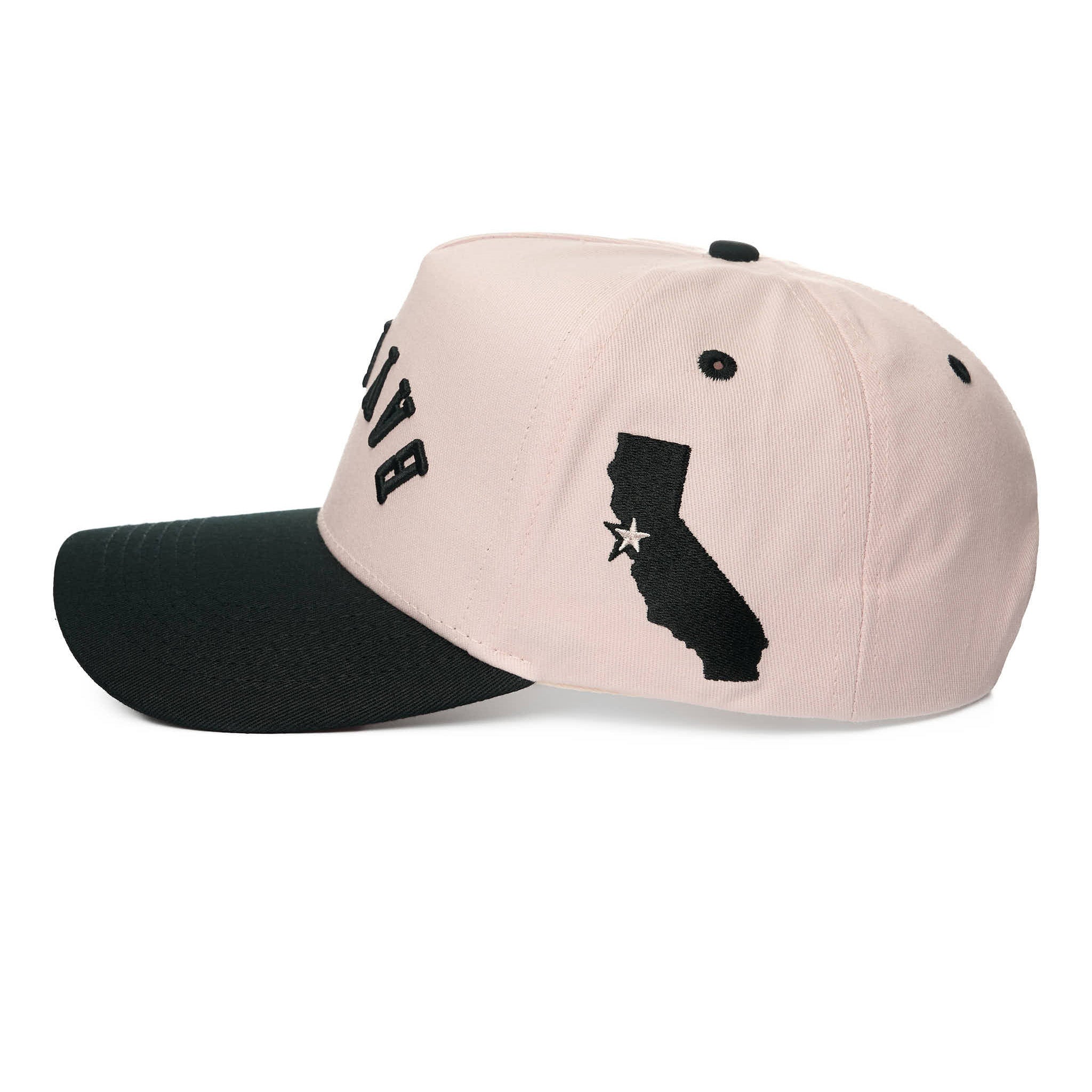 Two-tone cap with beige front and black visor on a white background
