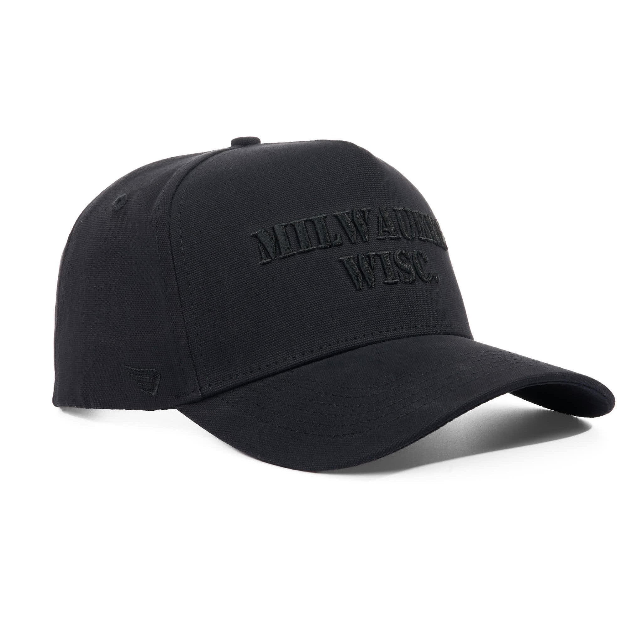 Black cap with 'Milwaukee, Wisc.' text on a white background