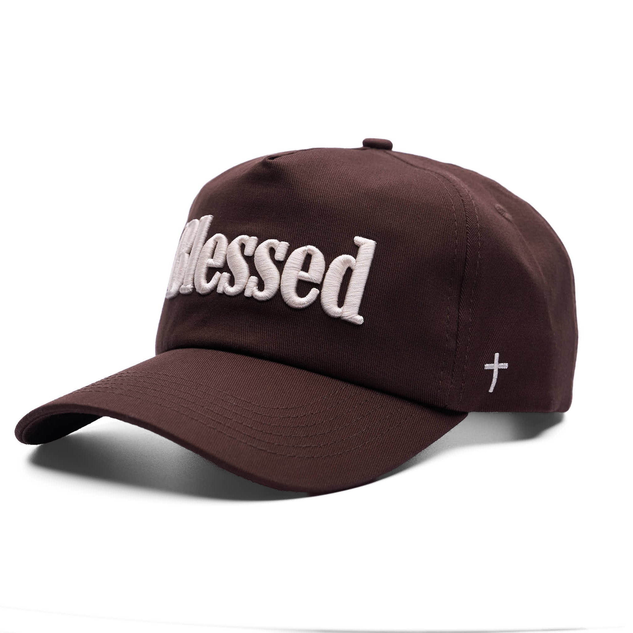 Brown cap with 'Blessed' text and cross symbol on a white background
