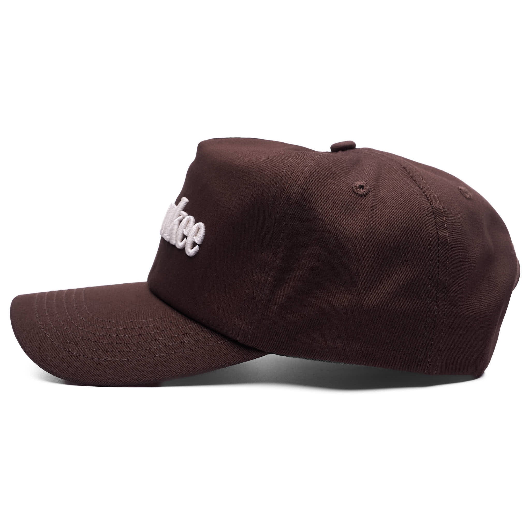 Brown cap with white text on a white background